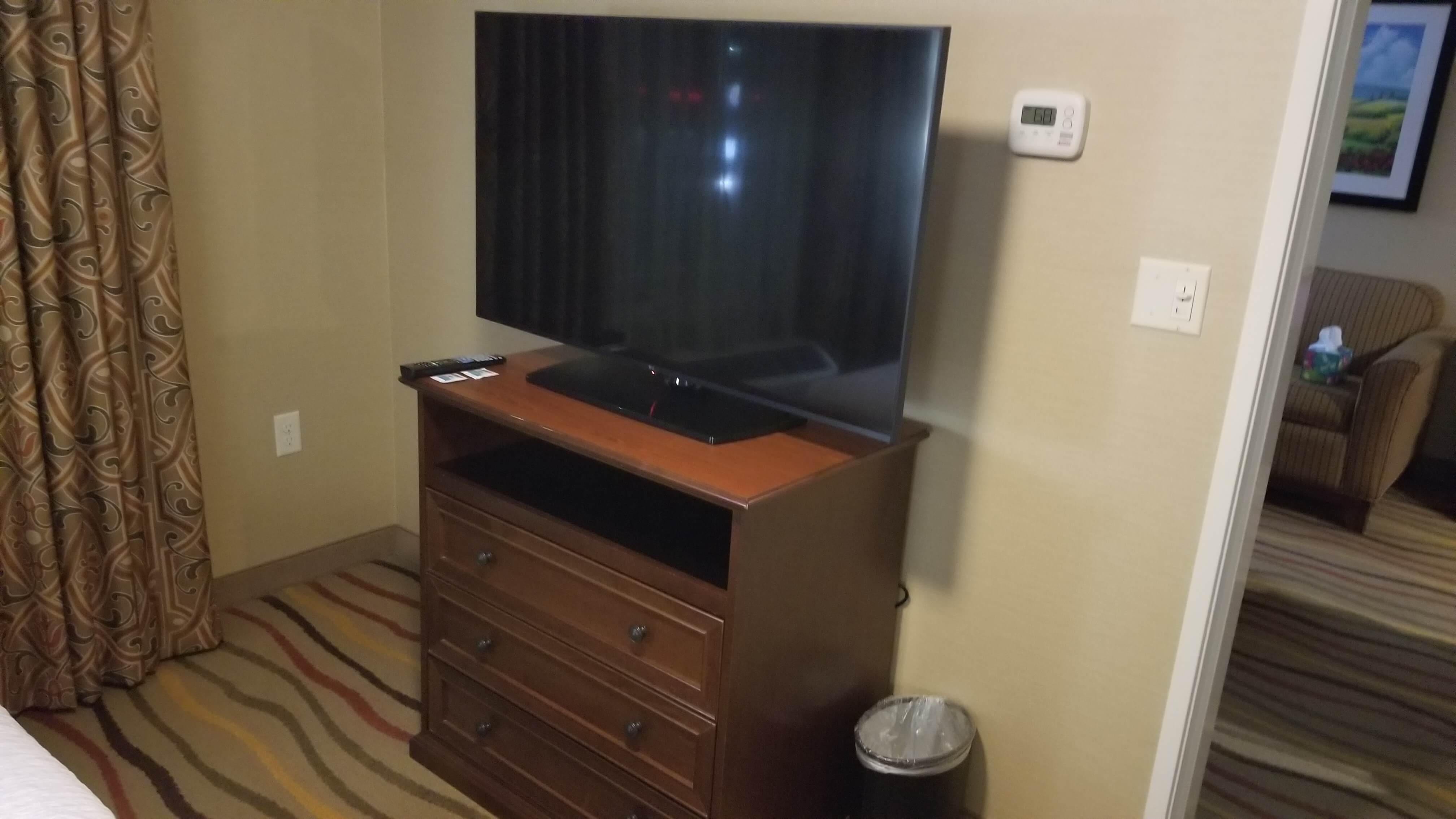 Picture of bedroom TV and dresser.